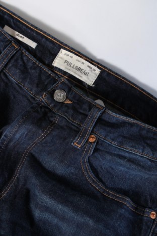 Męskie jeansy Pull&Bear, Rozmiar M, Kolor Niebieski, Cena 50,99 zł