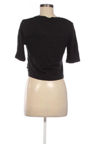 Γυναικείο t-shirt Kendall & Kylie, Μέγεθος S, Χρώμα Μαύρο, Τιμή 31,71 €