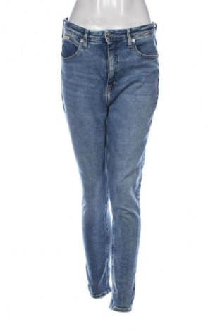 Damskie jeansy Calvin Klein, Rozmiar XL, Kolor Niebieski, Cena 204,67 zł