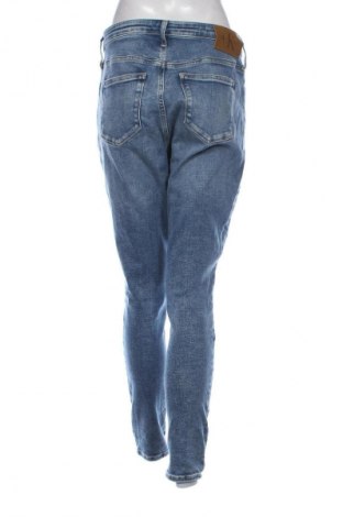 Damskie jeansy Calvin Klein, Rozmiar XL, Kolor Niebieski, Cena 204,67 zł