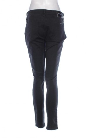 Damskie jeansy Calvin Klein Jeans, Rozmiar XL, Kolor Czarny, Cena 156,37 zł