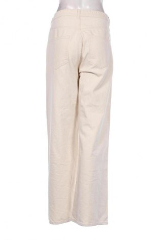 Damskie jeansy H&M, Rozmiar M, Kolor ecru, Cena 66,39 zł