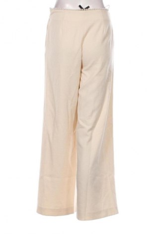 Pantaloni de femei Edward Achour Paris, Mărime S, Culoare Bej, Preț 665,16 Lei