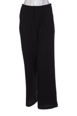 Damskie spodnie H&M, Rozmiar L, Kolor Czarny, Cena 43,99 zł