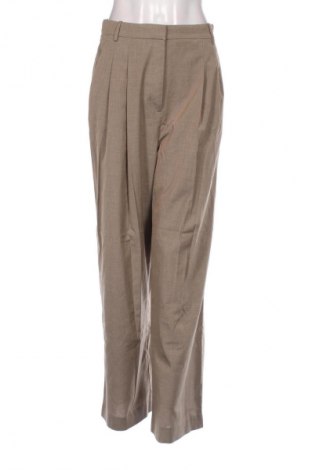 Damskie spodnie H&M, Rozmiar M, Kolor Beżowy, Cena 63,22 zł