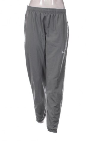 Γυναικείο αθλητικό παντελόνι Nike, Μέγεθος M, Χρώμα Γκρί, Τιμή 29,99 €