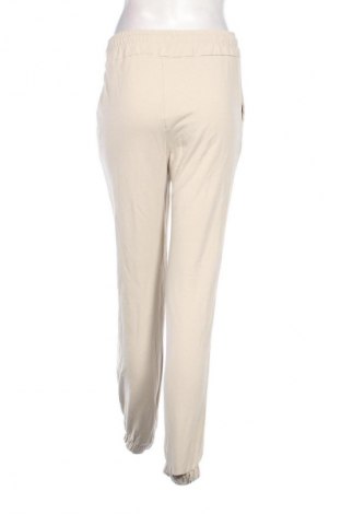Női sport nadrág Unbranded, Méret M, Szín Ekrü
, Ár 5 829 Ft