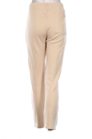 Damskie spodnie sportowe Unbranded, Rozmiar L, Kolor Beżowy, Cena 74,02 zł