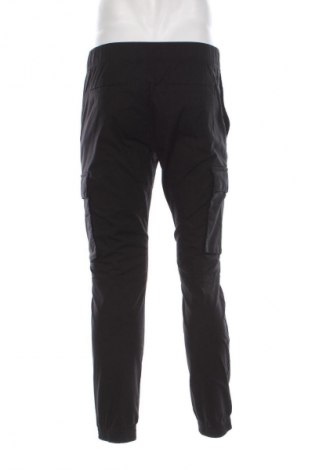 Pantaloni de bărbați Calvin Klein Jeans, Mărime M, Culoare Negru, Preț 544,99 Lei