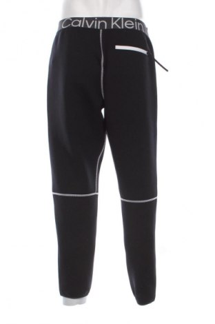 Herren Sporthose Calvin Klein, Größe M, Farbe Schwarz, Preis 47,73 €
