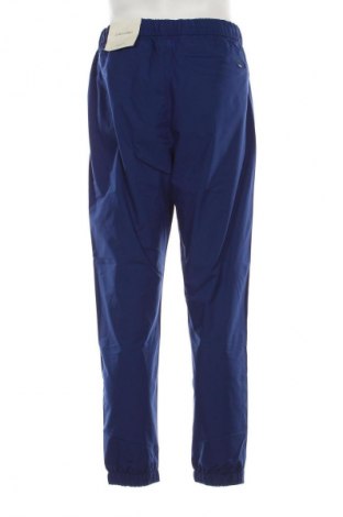 Pantaloni trening de bărbați Calvin Klein, Mărime M, Culoare Albastru, Preț 346,99 Lei