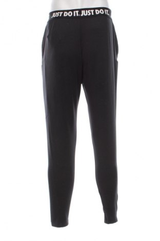 Herren Sporthose Nike, Größe M, Farbe Schwarz, Preis 26,99 €