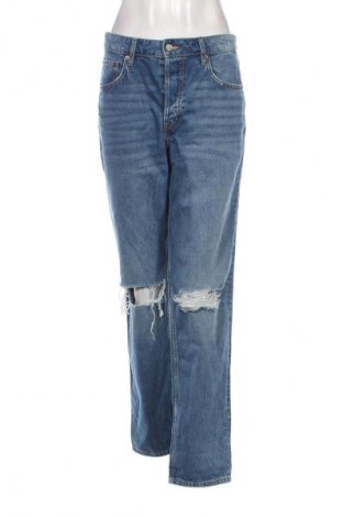 Damskie jeansy H&M Divided, Rozmiar L, Kolor Niebieski, Cena 46,99 zł