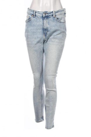 Damskie jeansy H&M, Rozmiar L, Kolor Niebieski, Cena 66,67 zł