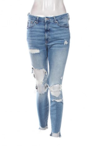 Damskie jeansy H&M, Rozmiar L, Kolor Niebieski, Cena 66,67 zł