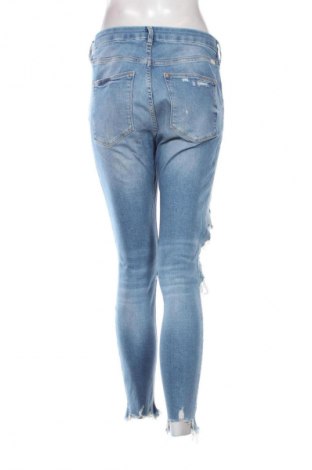 Damskie jeansy H&M, Rozmiar L, Kolor Niebieski, Cena 66,67 zł