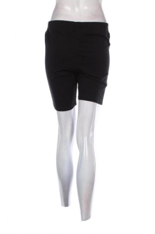 Damskie legginsy Decathlon, Rozmiar XL, Kolor Czarny, Cena 59,77 zł