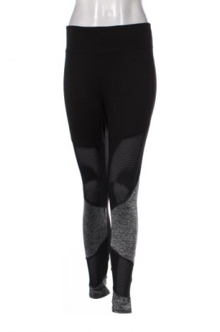 Damskie legginsy Hot Kiss, Rozmiar XL, Kolor Kolorowy, Cena 59,77 zł
