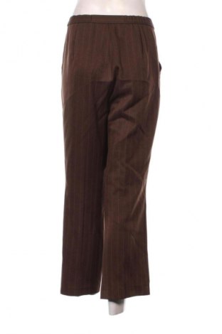 Damskie spodnie Marks & Spencer, Rozmiar L, Kolor Kolorowy, Cena 63,99 zł