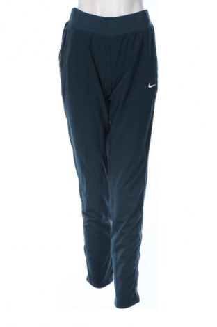 Damskie spodnie Nike, Rozmiar M, Kolor Zielony, Cena 126,44 zł