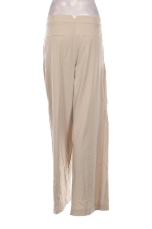 Damskie spodnie Zara, Rozmiar M, Kolor Beżowy, Cena 54,99 zł