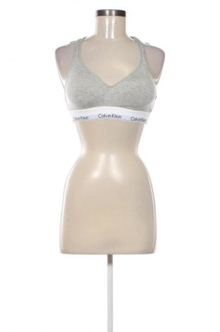 Dámský sportovní top  Calvin Klein, Velikost M, Barva Vícebarevné, Cena  799,00 Kč