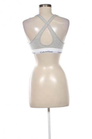 Dámský sportovní top  Calvin Klein, Velikost M, Barva Vícebarevné, Cena  799,00 Kč