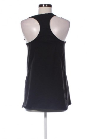 Damski sportowy top Decathlon, Rozmiar XL, Kolor Kolorowy, Cena 34,48 zł