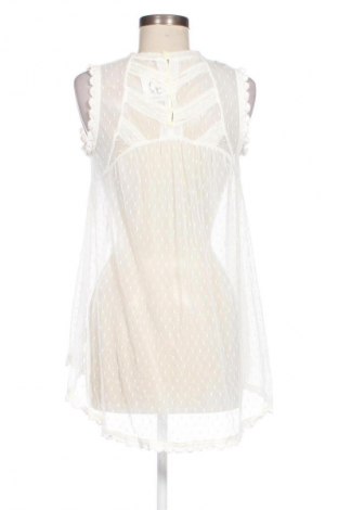 Női top Unbranded, Méret M, Szín Ekrü
, Ár 4 829 Ft