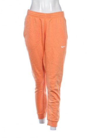 Damskie spodnie sportowe Nike, Rozmiar M, Kolor Pomarańczowy, Cena 140,99 zł
