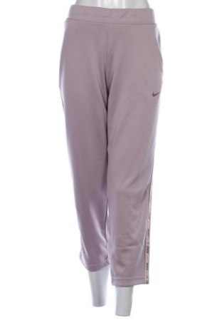 Γυναικείο αθλητικό παντελόνι Nike, Μέγεθος L, Χρώμα Σάπιο μήλο, Τιμή 28,99 €