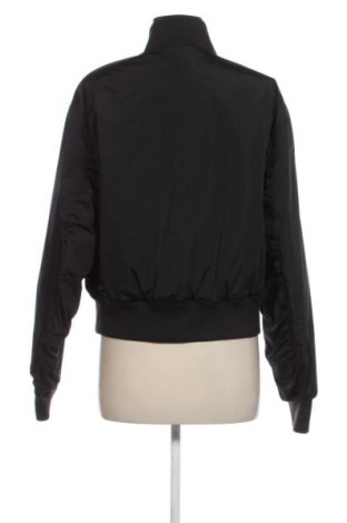 Γυναικείο μπουφάν Tommy Jeans, Μέγεθος L, Χρώμα Μαύρο, Τιμή 182,99 €