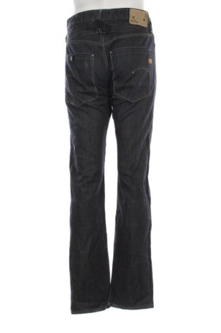 Męskie jeansy G-Star Raw, Rozmiar M, Kolor Niebieski, Cena 197,99 zł