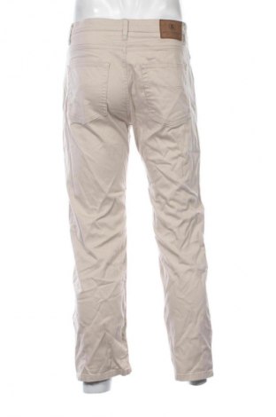 Męskie spodnie Marks & Spencer, Rozmiar M, Kolor Beżowy, Cena 30,99 zł