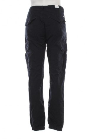 Pánske nohavice  Tommy Jeans, Veľkosť L, Farba Modrá, Cena  86,95 €