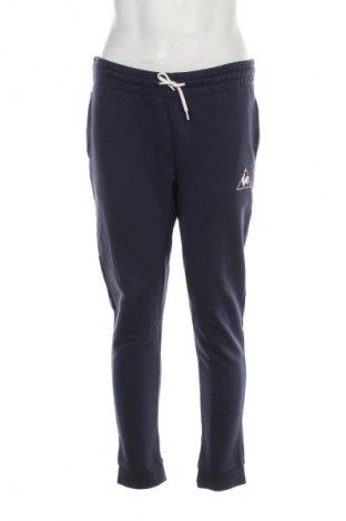 Męskie spodnie sportowe Le Coq Sportif, Rozmiar S, Kolor Niebieski, Cena 110,07 zł