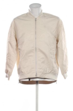 Férfi dzseki Calvin Klein Jeans, Méret S, Szín Bézs, Ár 78 399 Ft