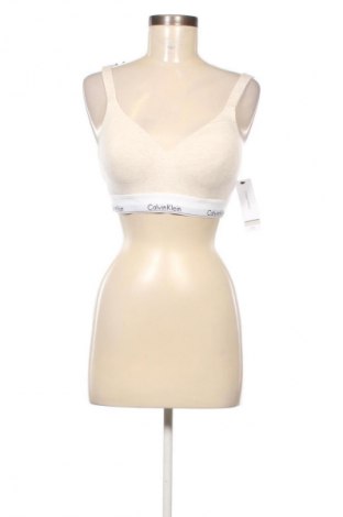 Biustonosz Calvin Klein Jeans, Rozmiar L, Kolor ecru, Cena 239,99 zł