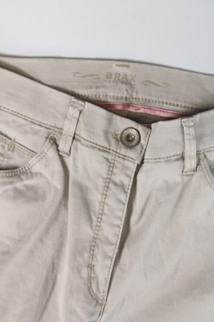 Damskie spodnie Brax, Rozmiar XS, Kolor Beżowy, Cena 156,73 zł