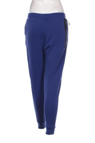 Pantaloni trening de femei Nike, Mărime S, Culoare Albastru, Preț 104,59 Lei