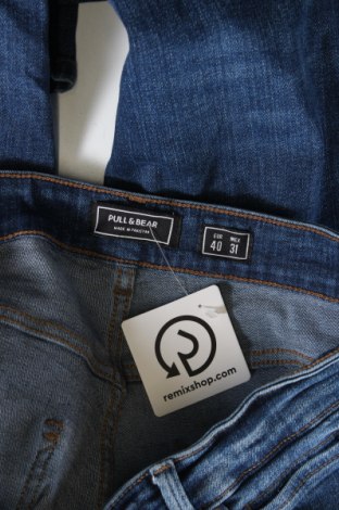 Męskie jeansy Pull&Bear, Rozmiar S, Kolor Niebieski, Cena 62,99 zł