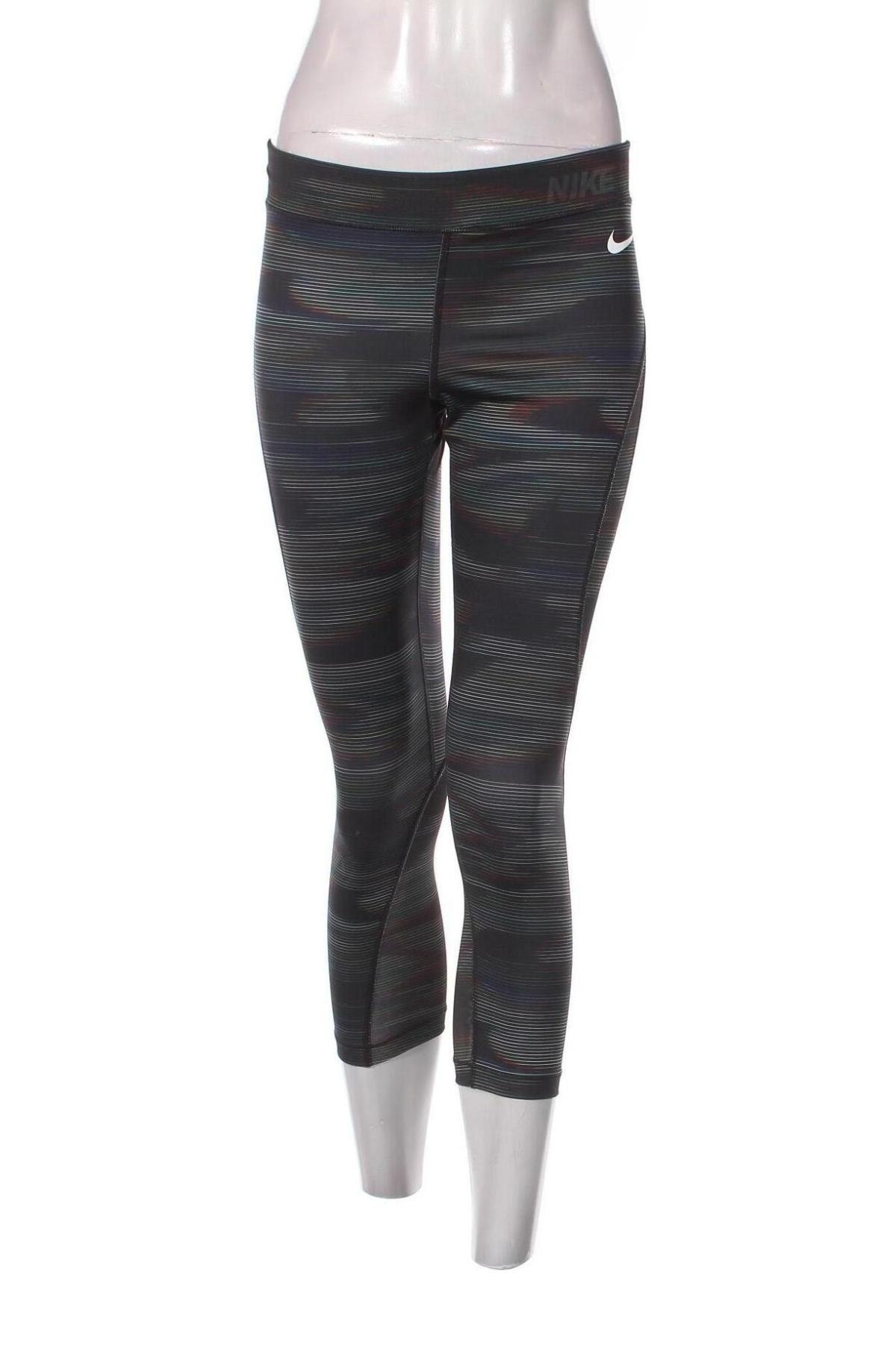 Damskie legginsy Nike, Rozmiar L, Kolor Kolorowy, Cena 65,99 zł