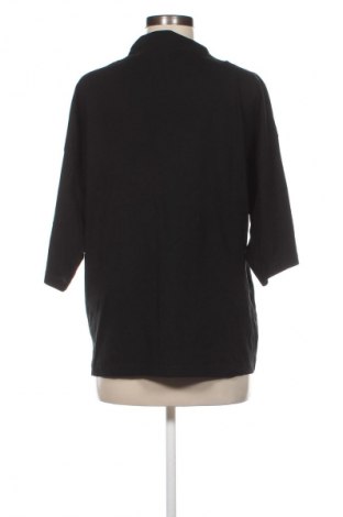 Bluzka damska LC Waikiki, Rozmiar L, Kolor Czarny, Cena 89,66 zł