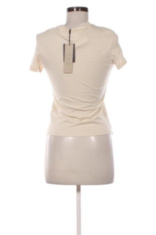 Γυναικείο t-shirt Tommy Jeans, Μέγεθος M, Χρώμα  Μπέζ, Τιμή 47,99 €