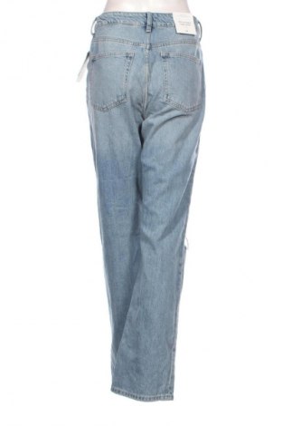 Damskie jeansy H&M, Rozmiar L, Kolor Niebieski, Cena 105,70 zł