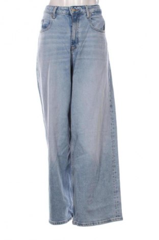 Дамски дънки Tommy Jeans, Размер L, Цвят Син, Цена 174,99 лв.