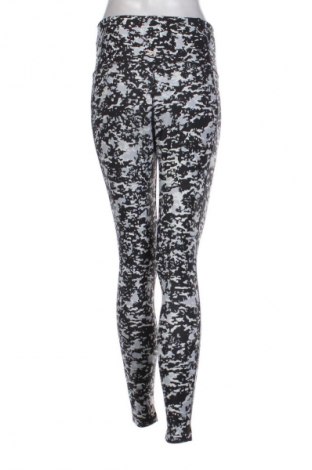 Damskie legginsy Reebok, Rozmiar M, Kolor Kolorowy, Cena 77,75 zł