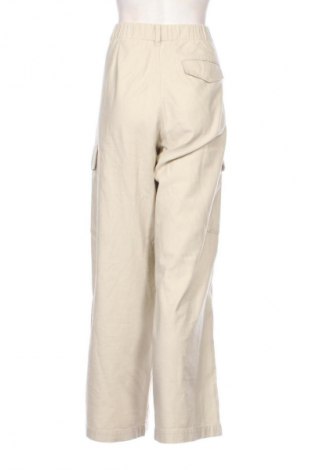 Pantaloni de femei Uniqlo, Mărime XL, Culoare Bej, Preț 107,89 Lei