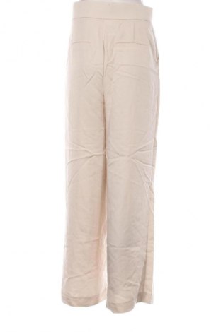 Damskie spodnie Zara, Rozmiar S, Kolor Beżowy, Cena 62,07 zł