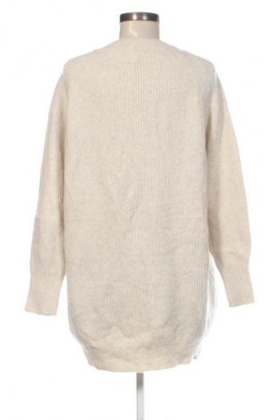 Damski sweter Uniqlo, Rozmiar M, Kolor Beżowy, Cena 119,99 zł